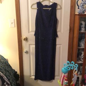 Elegant  sequined dress with beadingat the waistline